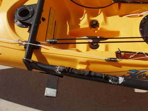 Back in the cockpit, I installed a small jam cleat along the port side coaming. This makes it easy to adjust the height of the sail off the deck, and easy to fully release the tack line if winds suddenly come up and I want to unload the jib.