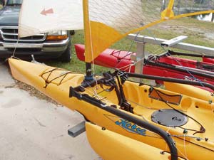 A quick tug on the halyard, and I have the jib up! In this picture, the end of the halyard is secured to the tiny cleat on the bulkhead just underneath the mast base.