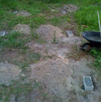 The next day, I filled the holes and put up the frame and fitted on the polytarp canopy.