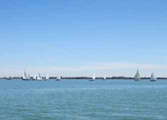 Calm winds delay the catboat races.