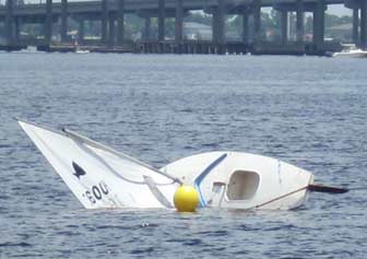 Capsized Sunfish