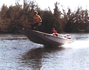 My buddy Gene bowriding in my Boston Whaler