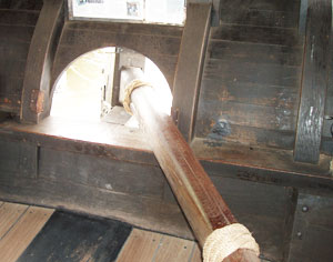 The large tiller swept a broad arc