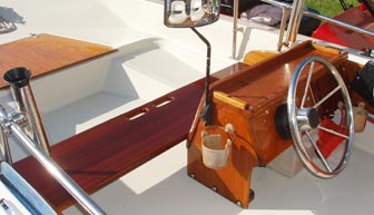 The refinished console and new mahogany bench seat