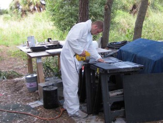 Adam Cuts Rubber Mat