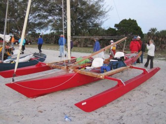 Sleek Red Trimaran